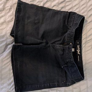 A pair of black jean shorts